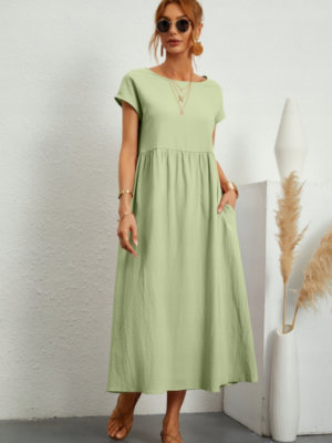 Robe trapèze manche courte vert pastel avec poches midi polyvalente